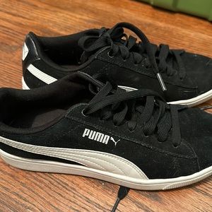 Pumas. Worn but still have a lot of life.